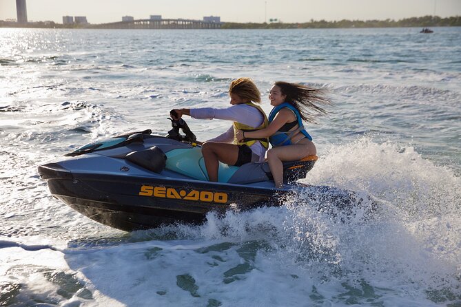 3 Hour Party Boat Jet ski Banana Tube and open bar in Miami - The Miami route, from skyline to island water