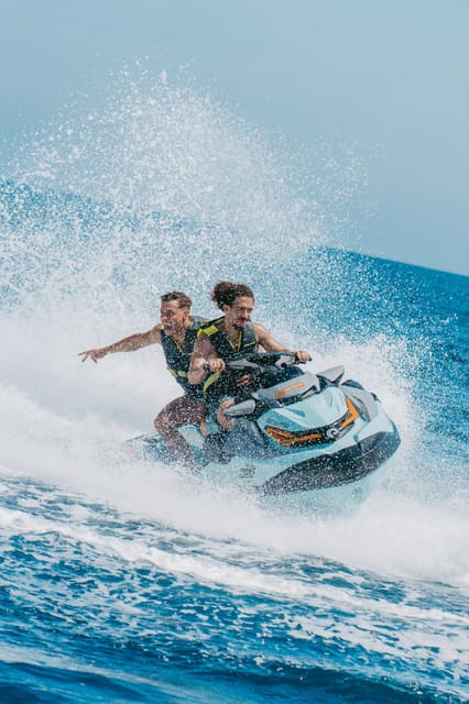 Alcudia: Bay of Alcudia Jet Ski Tour with Photos - Passing Faro de Aucanada