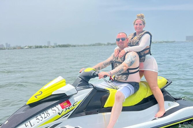 AquaFusion Combo: Jet Ski + Party Boat Excursion (Groups) - Water toys, music, snacks, and waiting time