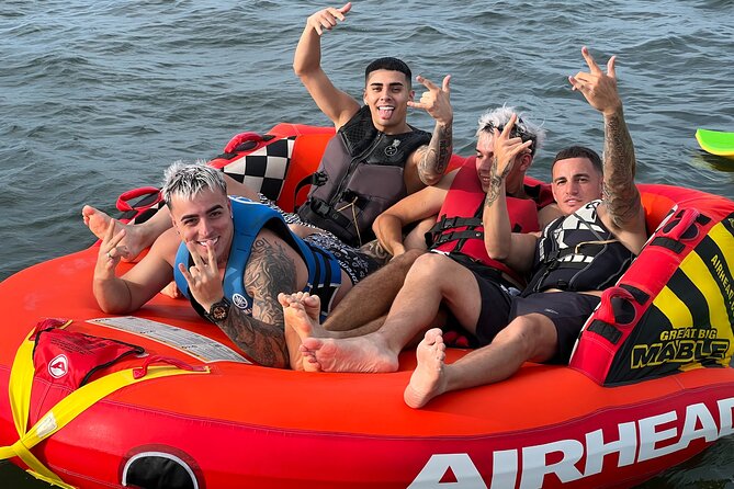 Aquatic Adventure: Boat Tour with Jetskis, Tubing, and Open Bar - Jet skis, tubing, and the choice of pace