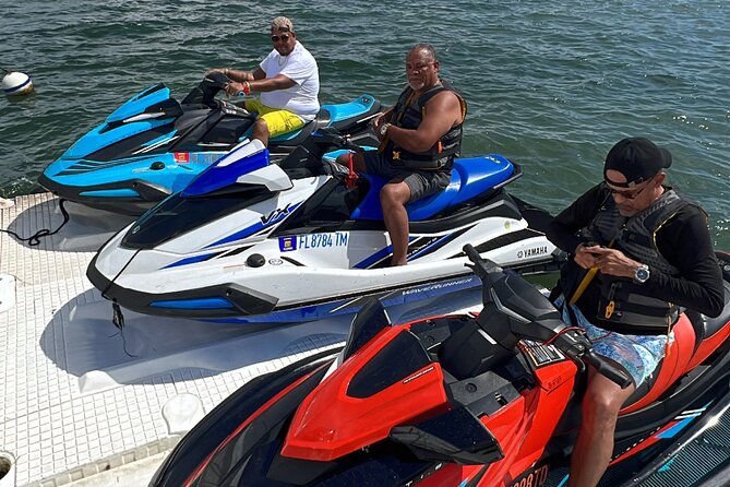 Aquatic Adventure: Boat Tour with Jetskis, Tubing, and Open Bar - What is included, and what costs extra