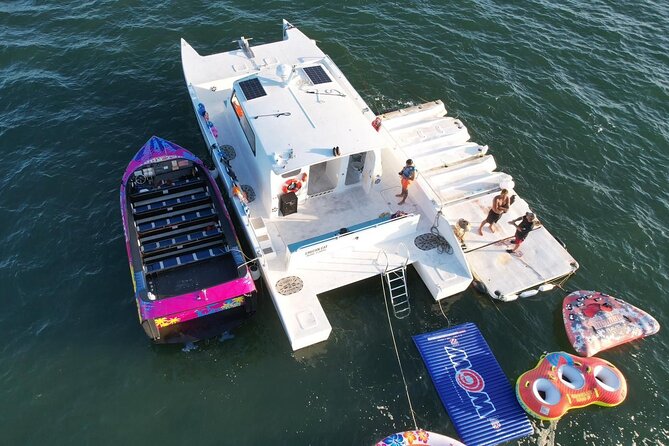 Aquatic Adventure: Boat Tour with Jetskis, Tubing, and Open Bar - Is it suitable for families?