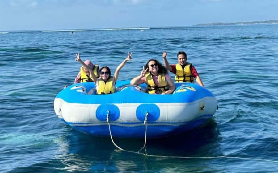 Bali: Watersport Rolling Donut Parasailing Jetski Exclusive - Parasailing above the coast
