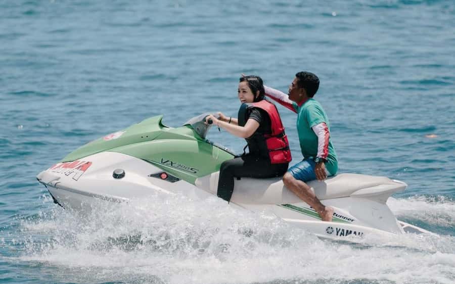 Bali: Watersport Rolling Donut Parasailing Jetski Exclusive - Guided jet ski time for first-time riders