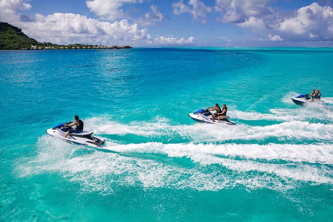 Bora Bora Jet Ski Tour - Cruising past bungalows, yachts, and Mt. Otemanu