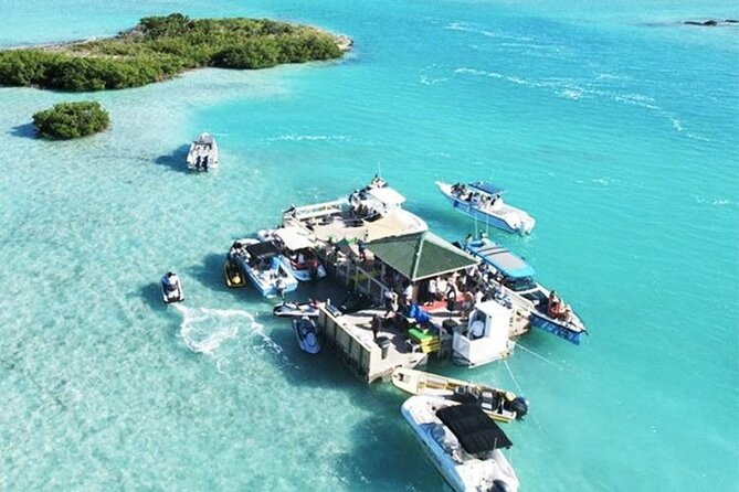 FAMOUS SHIPWRECK, Tiki Bar & Iguana Island Private Jet Ski Tour - The ride from Long Bay Beach to the south side