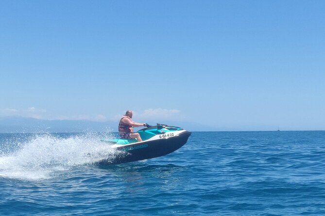 Fuengirola: Alquiler Jet ski 30 min / 1 hour - Riding a Sea-Doo GTX off Fuengirola