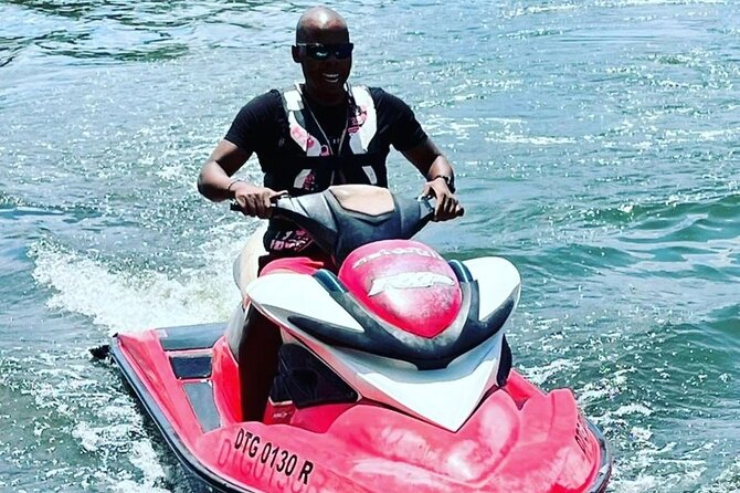 Jet Ski/ Parasailig Water Activity in Montego Bay Jamaica. - The safety briefing comes before the fun
