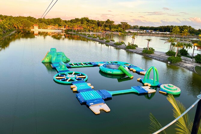 Jet Ski Punta Cana Water Park with Zipline & Inflatable Course - Tackling the giant inflatable obstacle course