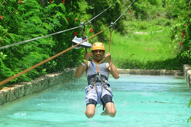 Jet Ski Punta Cana Water Park with Zipline & Inflatable Course - Holding on during the donut ride