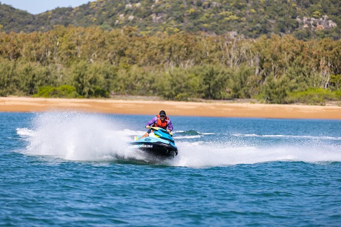 Magnetic Island 60-Minute Jet Ski Hire – 1 to 8 People - Taking the handlebars at Horseshoe Bay
