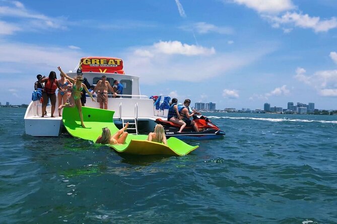 Miami Catamaran & Watersports: Jet Ski, Banana Boat & Drinks - Banana boat, towable tube, and floating mats