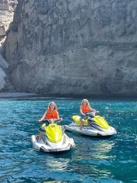 Santorini:Volcanic Beaches Cruise With Jet Ski - Red Beach: Santorini’s famous red cliffs from the sea