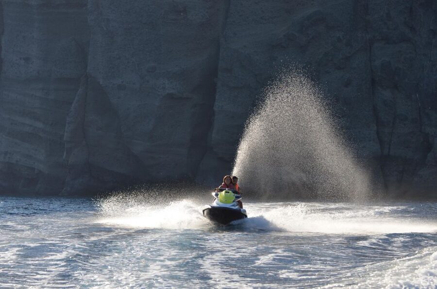 Santorini:Volcanic Beaches Cruise With Jet Ski - Leaving St. George Beach with a small group